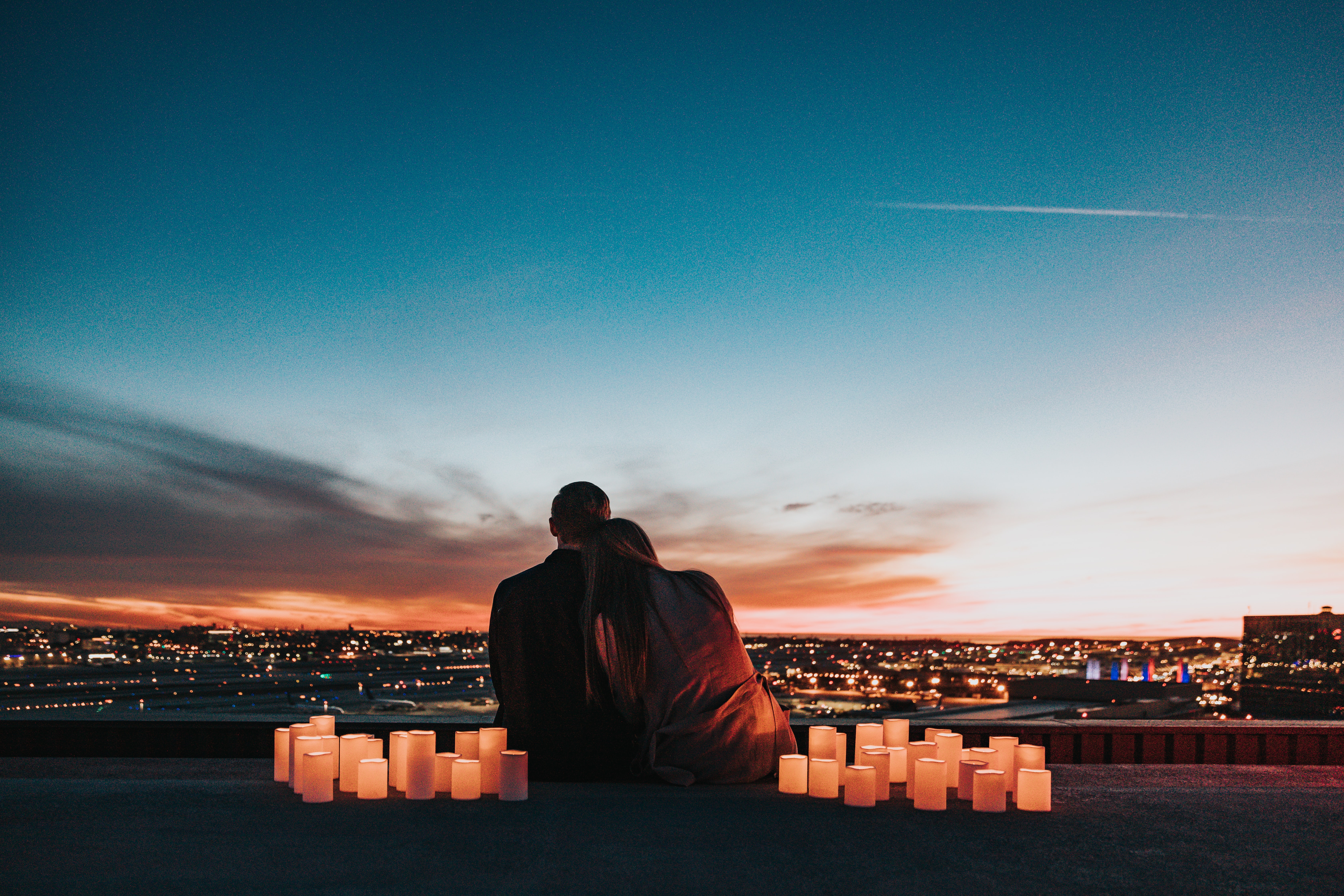 ThinkfulCupid - Two people with sunset and candles